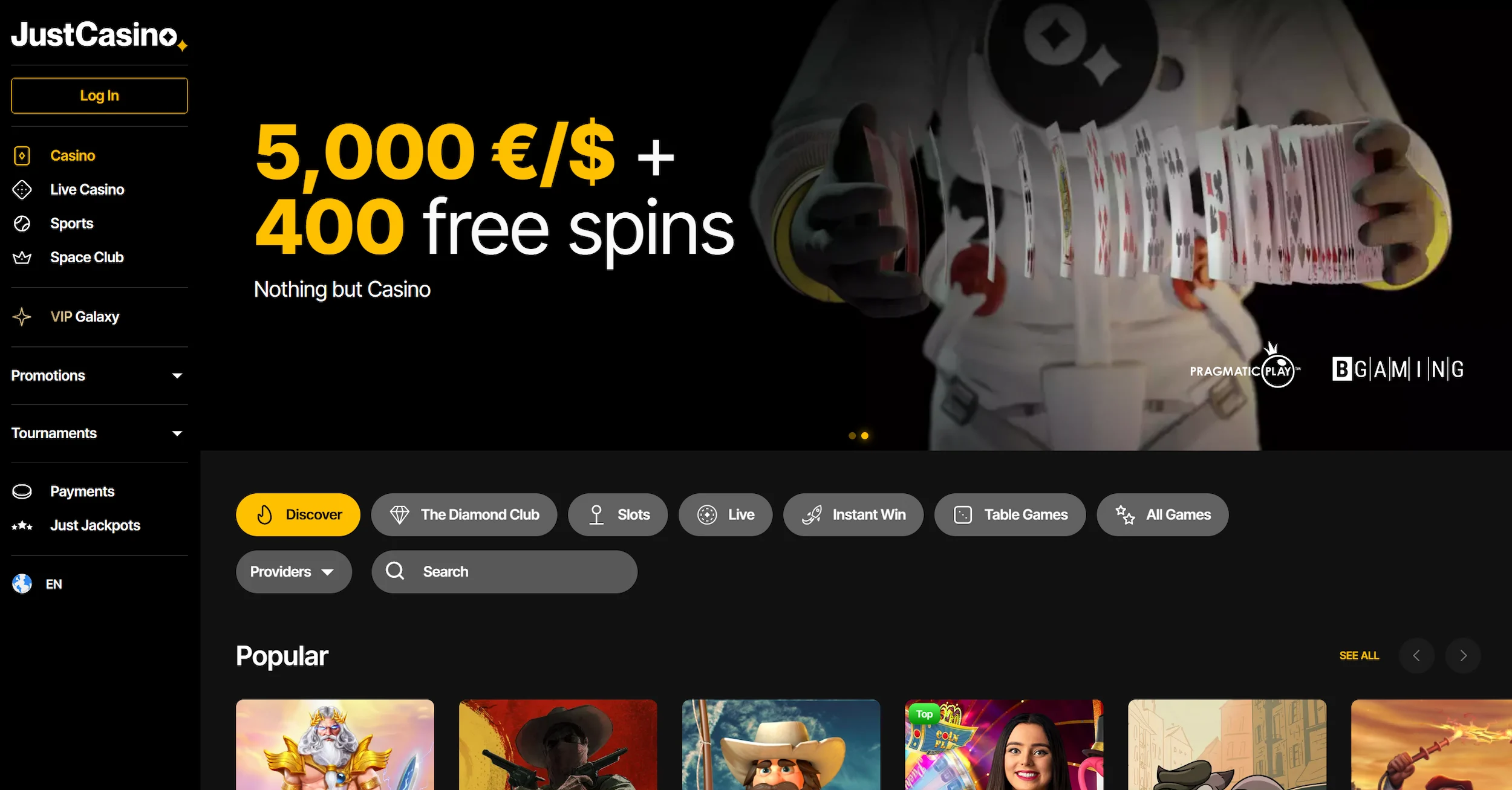 JustCasino page showing bonus offer, selection of popular online pokies and main site navigation